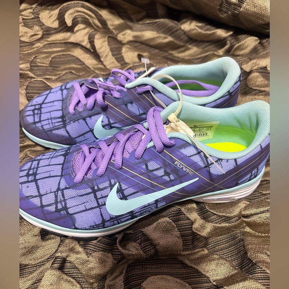 Brand new no. Box Nike womenswear fly wire in purple size 6.5